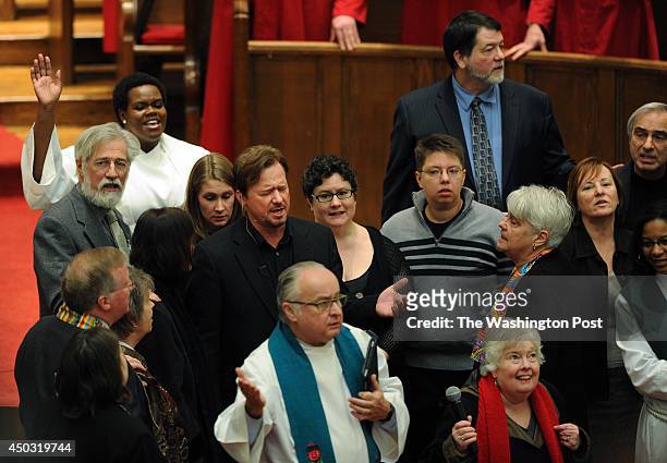 Rev. Frank Schaefer, top left center, takes part in a service at Foundry United Methodist Church on Sunday January 26, 2014 in Washington, DC....