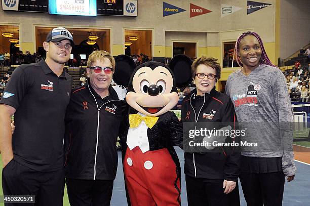 Andy Roddick, Singer Sir Elton John, tennis legend Billie Jean King and Venus Williams pose with Disney character Mickey Mouse during the Mylan World...