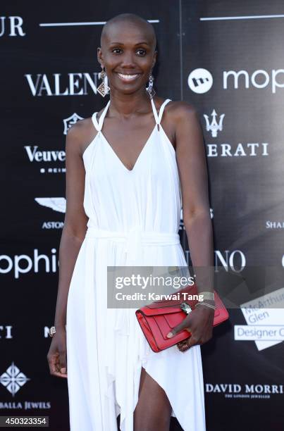 Tiffany Persons attends a gala dinner and auction to celebate the end of the Cash & Rocket tour at Natural History Museum on June 8, 2014 in London,...