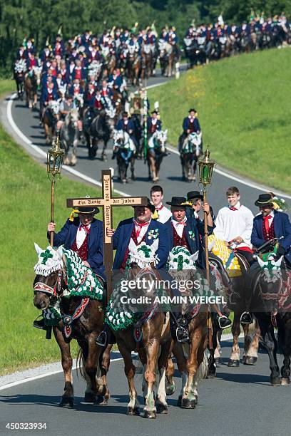 Participants of the Pentecostal horse ride parade on June 9, 2014 near Bad Koetzting, Germany. The procession with around 900 riders is one of the...