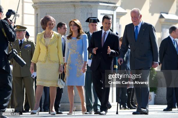 King Juan Carlos of Spain and Queen Sofia of Spain receive Mexican President Enrique Pena Nieto and wife Angelica Rivera at El Pardo Palace on June...