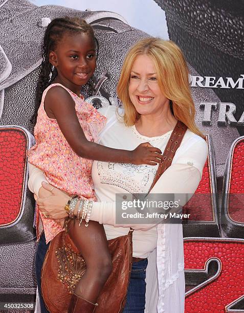 Actress Joely Fisher and daughter Olivia Luna Fisher-Duddy arrive at the Los Angeles premiere of 'How To Train Your Dragon 2' at the Regency Village...