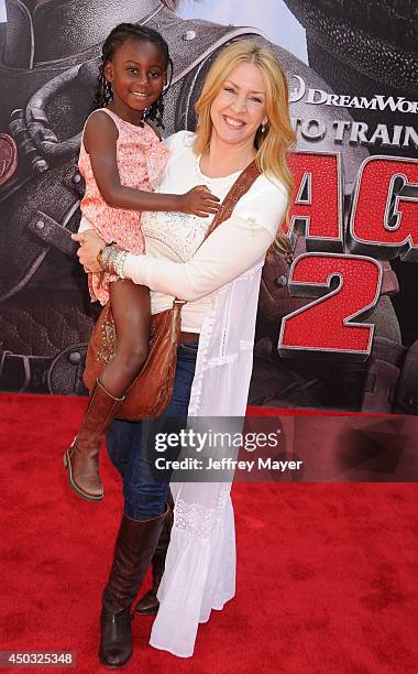 Actress Joely Fisher and daughter Olivia Luna Fisher-Duddy arrive at the Los Angeles premiere of 'How To Train Your Dragon 2' at the Regency Village...