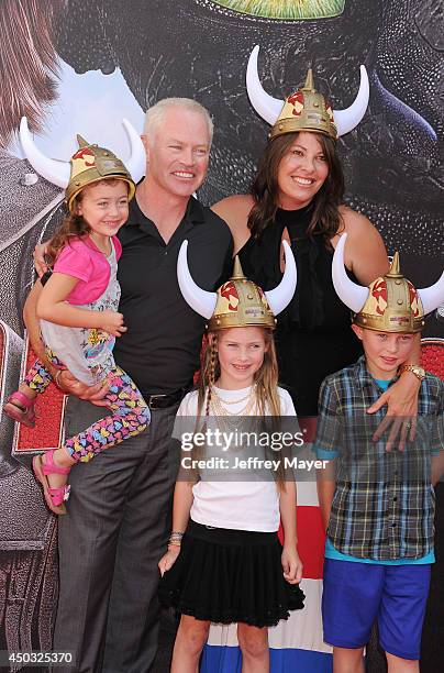 Actor Neal McDonough, wife Ruve McDonough and children arrive at the Los Angeles premiere of 'How To Train Your Dragon 2' at the Regency Village...