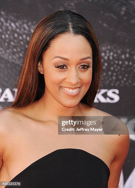 Actress Tia Mowry-Hardict arrives at the Los Angeles premiere of 'How To Train Your Dragon 2' at the Regency Village Theatre on June 8, 2014 in...