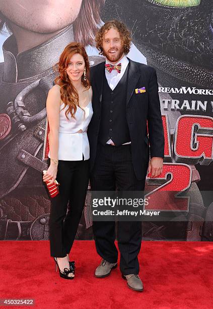Actress Kate Gorney and actor T.J. Miller arrive at the Los Angeles premiere of 'How To Train Your Dragon 2' at the Regency Village Theatre on June...