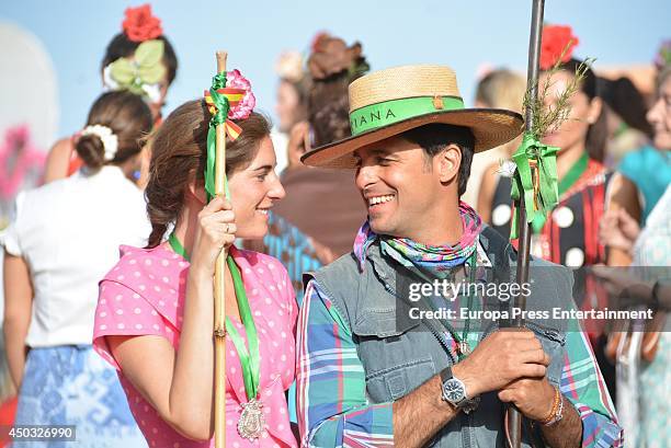 Francisco Rivera and Lourdes Montes are seen prepared to cross the Quema river during the annual El Rocio pilgrimage on June 6, 2014 in Huelva, Spain.