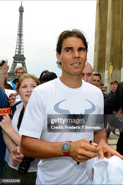 Rafael Nadal of Spain poses with the Coupe des Mousquetaires trophy in front of the Eiffel Tower after his victory against Novak Djokovic of Serbia...