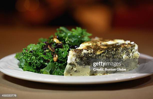 Pop-up brunch from Cuisine en Locale in Somerville, Mass. Features a spinach, caramelized red onion, goat cheese frittata and kale salad.