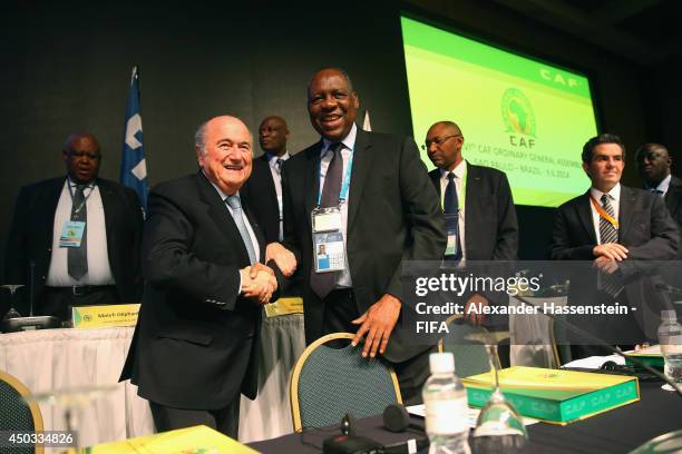 Issa Hayatou , President of the CAF welcomes FIFA President Joseph S. Blatter for the CAF confederation congress at Sheraton Sao Paulo WTC hotel on...