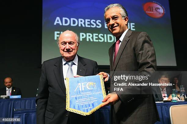 Shaikh Salman Bin Ebrhaim Al Khalifa, President of the AFC poses with FIFA President Joseph S. Blatter during the AFC confederation congress at...