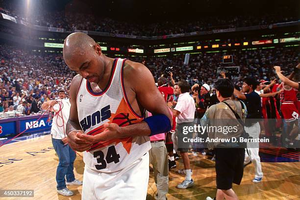 Charles Barkley of the Phoenix Suns walks off the court following Game Six of the 1993 NBA Finals on June 20, 1993 at American West Arena in Phoenix,...