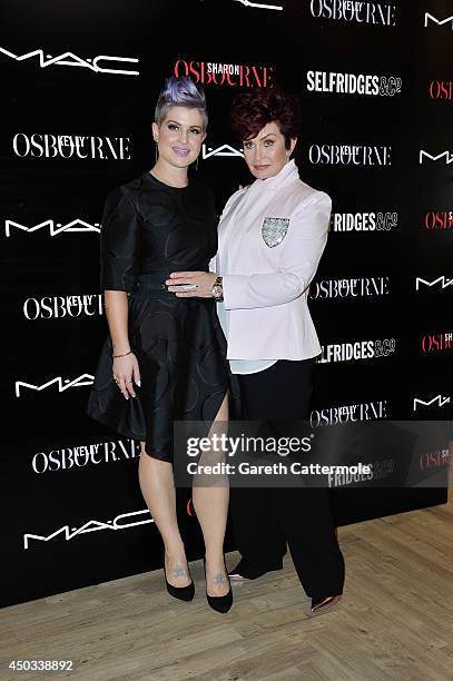 Kelly and Sharon Osbourne attend a photocall to launch the new Sharon & Kelly Osbourne for MAC collection at Selfridges on June 9, 2014 in London,...