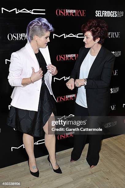 Kelly and Sharon Osbourne attend a photocall to launch the new Sharon & Kelly Osbourne for MAC collection at Selfridges on June 9, 2014 in London,...