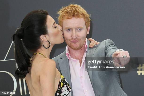 Tony Curran and Jaime Murray attend "Defiance" photocall at the Grimaldi Forum on June 9, 2014 in Monte-Carlo, Monaco.