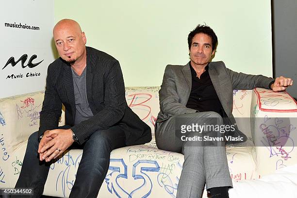 Jimmy Stafford and Pat Monahan of pop rock band "Train" visit Music Choice on June 9, 2014 in New York City.