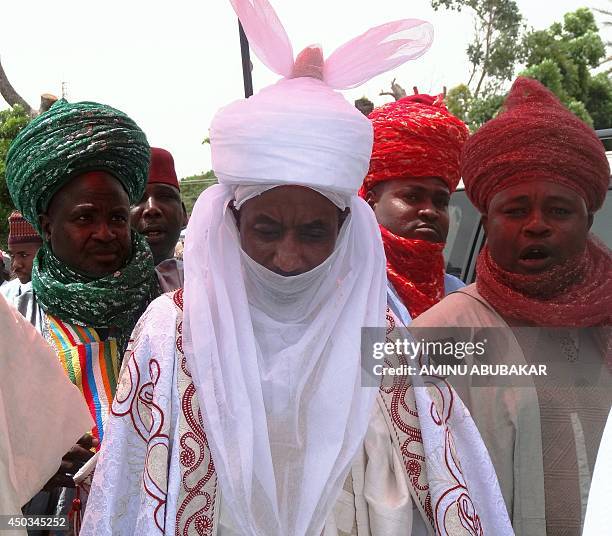 The new emir of the ancient northern Nigerian city of Kano and former Governor of Central Bank Sanusi Lamido Sanusi walks out of the Africa House...