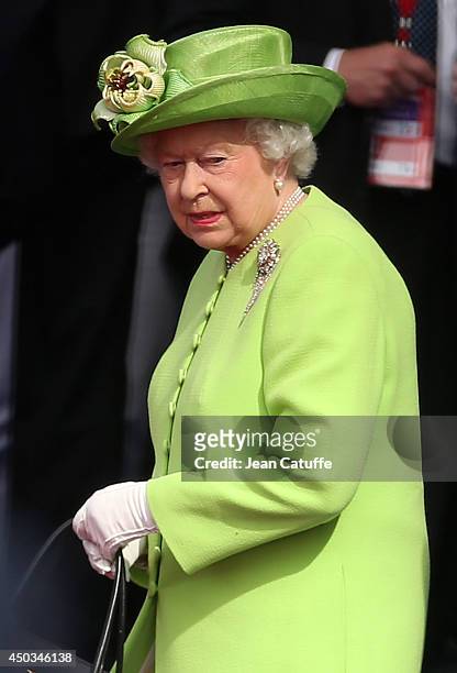 Queen Elizabeth II attends the International Ceremony at Sword Beach to commemorate the 70th anniversary of the D-Day landings on June 6, 2014 in...