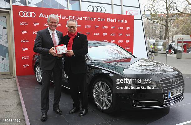 Dieter Kosslick , Director of the Berlinale International Film Festival, and Audi regional executive Alexander Schuhmacher pose in front of an Audi...