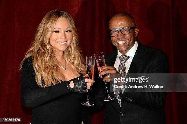 Singer Mariah Carey and Kevin Liles announce the launch of her Go N'Syde bottle "Butterfly" at the Saint Regis Hotel on June 9, 2014 in New York City.