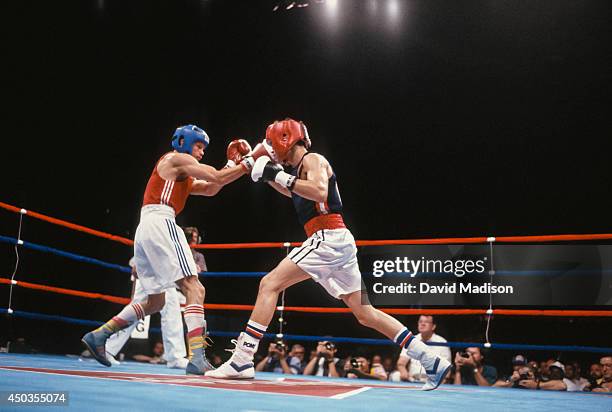 Oscar De La Hoya boxes Airat Khamatov during the semi finals of the 57 kg class of the 1990 Goodwill Games on August 2, 1990 at the Seattle Center...