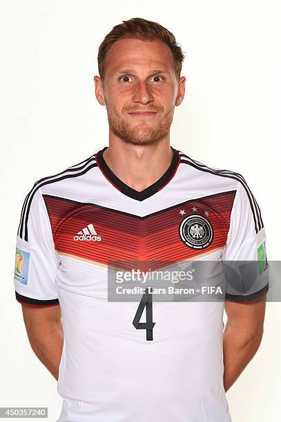 Benedikt Hoewedes of Germany poses during the official FIFA World Cup 2014 portrait session on June 8, 2014 in Salvador, Brazil.