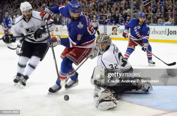 Anton Stralman of the New York Rangers looks to get the puck past goaltender Jonathan Quick of the Los Angeles Kings during the second period of Game...