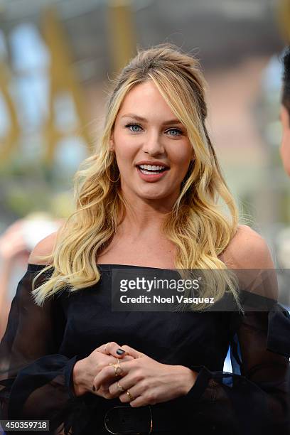 Candice Swanepoel visits "Extra" at Universal Studios Hollywood on June 9, 2014 in Universal City, California.