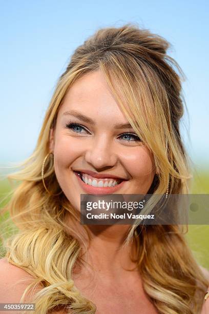 Candice Swanepoel visits "Extra" at Universal Studios Hollywood on June 9, 2014 in Universal City, California.