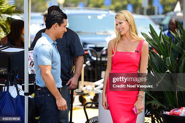 Beth Stern talks to Mario Lopez at "Extra" at Universal Studios Hollywood on June 9, 2014 in Universal City, California.