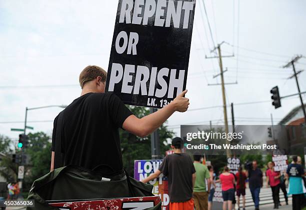 Members of Westboro Baptist Church protest near Woodrow Wilson High School on Monday June 09, 2014 in Washington, DC. The high school's principal,...