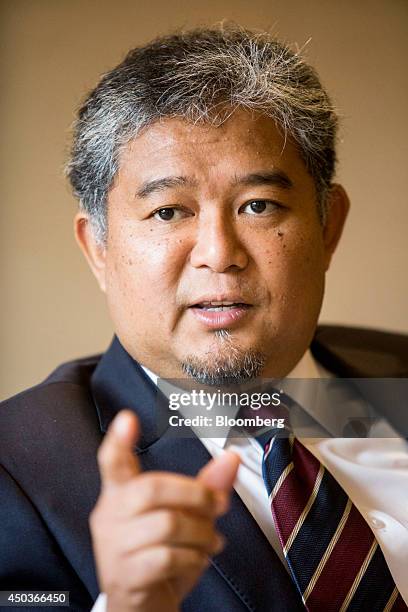 Faizal Mansor, chief financial officer of Malaysia Airports Holdings Bhd., gestures as he speaks during an interview at the Invest Malaysia...