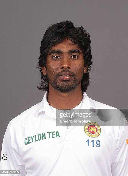 Nuwan Pradeep of Sri Lanka poses for a headshot during the Sri Lanka portrait session at Lord's Cricket Ground on June 10, 2014 in London, England.