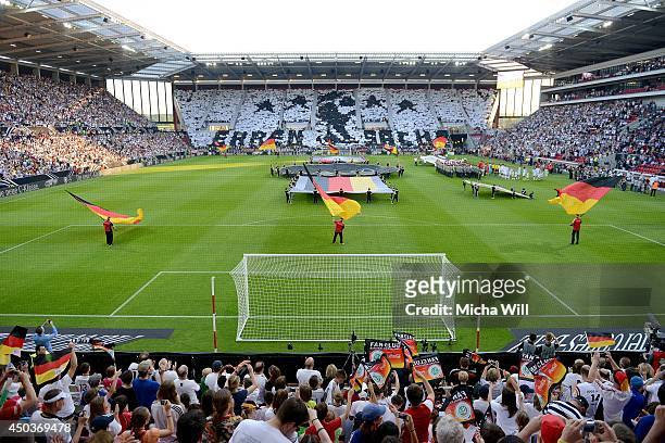 Fans of team Germany show a choreography prior to the international friendly match between Germany and Armenia at Coface Arena on June 6, 2014 in...