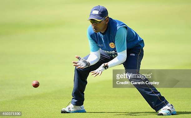 Mahela Jayawardena of Sri Lanka takes part in a fielding drill during a nets session at Lord's Cricket Ground on June 10, 2014 in London, England.