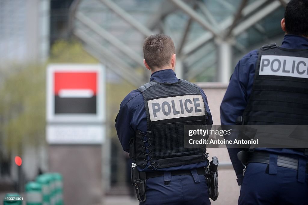 Paris Police Hunt Gunman Following Attacks At Newspaper And Bank