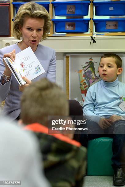 Queen Mathilde of Belgium attends a reading session with children suffering from cancer at the UZ Hospital on November 18, 2013 in Leuven, Belgium.