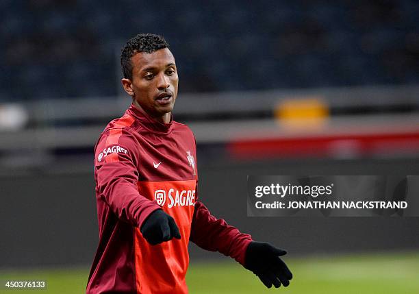 Portugal's national football player Nani takes part in a training session at the Friends Arena in Solna, near Stockholm on November 18 on the eve of...