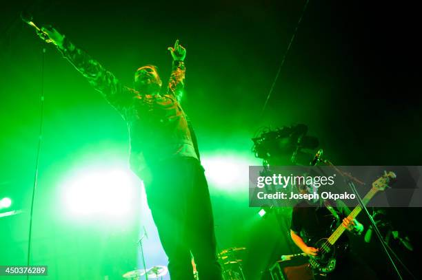 Rob Rolfe, Rou Reynolds and Chris Batten of Enter Shikari performs on stage during Vans Warped Tour 2013 at Alexandra Palace on November 17, 2013 in...