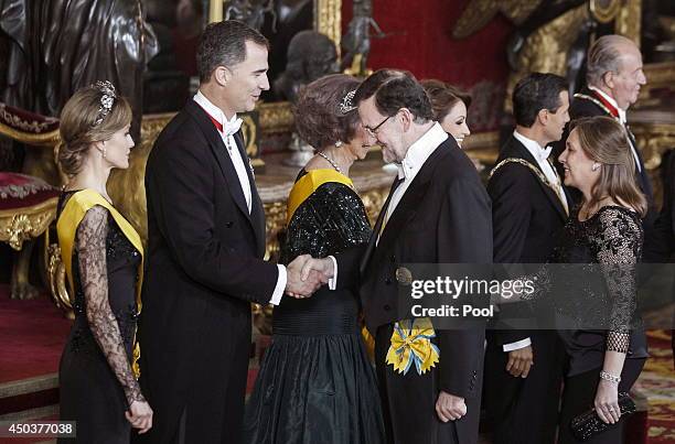 Princess Letizia of Spain, Prince Felipe of Spain greet Spanish Prime Minister Mariano Rajoy at a Gala Dinner in honour of Mexican President Enrique...