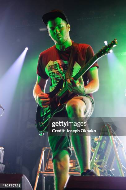 Liam Clewlow of Enter Shikari performs on stage during Vans Warped Tour 2013 at Alexandra Palace on November 17, 2013 in London, United Kingdom.