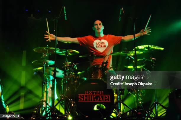 Rob Rolfe of Enter Shikari performs on stage during Vans Warped Tour 2013 at Alexandra Palace on November 17, 2013 in London, United Kingdom.