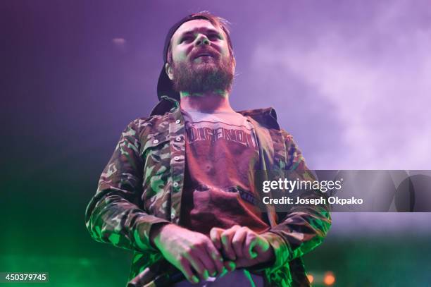 Rou Reynolds of Enter Shikari performs on stage during Vans Warped Tour 2013 at Alexandra Palace on November 17, 2013 in London, United Kingdom.