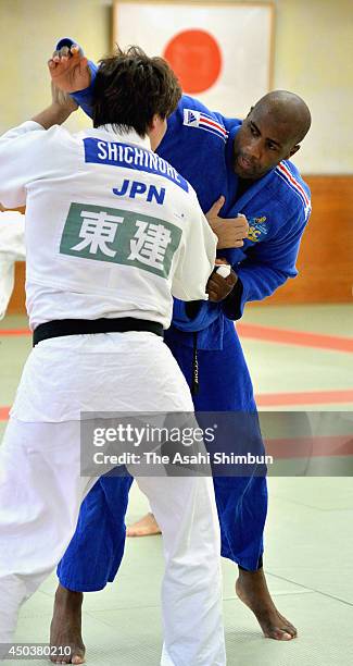 London Olympic Judo Open weight gold medalist Teddy Riner of France and Ryu Shichinohe compete during a training session of the Judo Japanese...