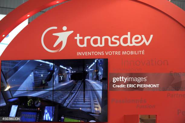 Picture shows the logo of French international public transport company Transdev at the "Transports Publics 2014" European Mobility Exhibition in...