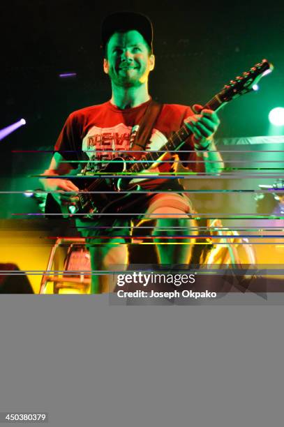 Rory Clewlow of Enter Shikari performs on stage during Vans Warped Tour 2013 at Alexandra Palace on November 17, 2013 in London, United Kingdom.