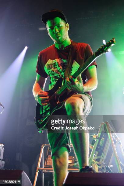 Rory Clewlow of Enter Shikari performs on stage during Vans Warped Tour 2013 at Alexandra Palace on November 17, 2013 in London, United Kingdom.