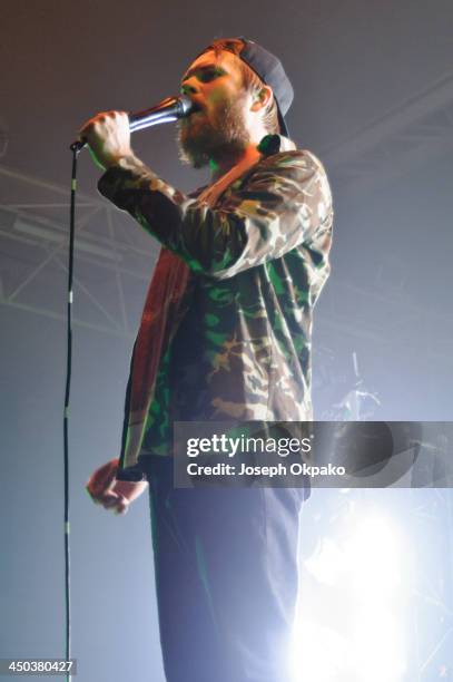 Rou Reynolds of Enter Shikari performs on stage during Vans Warped Tour 2013 at Alexandra Palace on November 17, 2013 in London, United Kingdom.