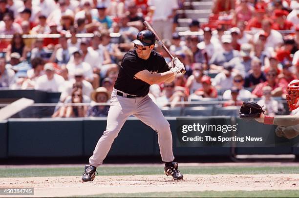 Lance Berkman of the Houston Astros bats against the St. Louis Cardinals on July 2, 2000 at Busch Stadium in St. Louis, Missouri.