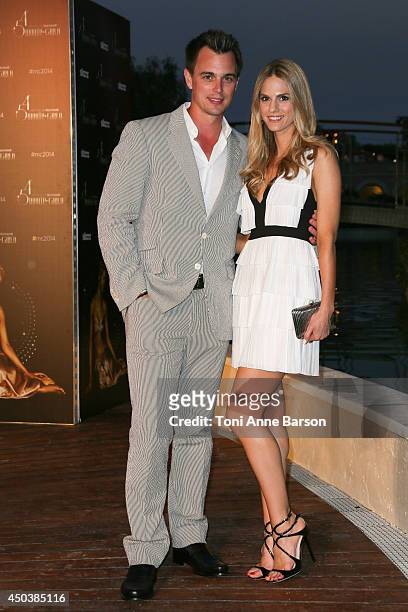Darin Brooks and girlfriend Kelly Kruger attend a Party at the Monte Carlo Bay Hotel on June 9, 2014 in Monte-Carlo, Monaco.